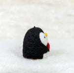Felted penguin with heart